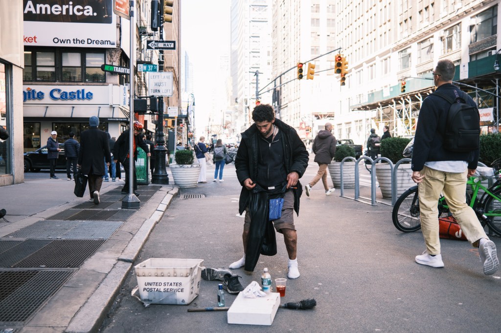 Man acting erratically on 7th avenue by 37th street in Manhattan, New York on March 18, 2025, photo by Stephen Yang for the New York Post